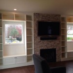 custom entertainment center, brick fire place, white shelving, custom built in